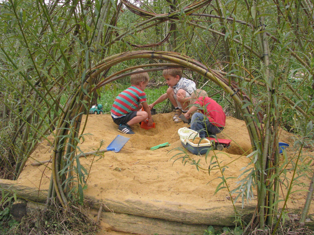 Children play in the sandpit