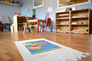 Montessori preschool classroom. "Preschool classroom" by montessori toolkit is licensed under CC BY 2.0 