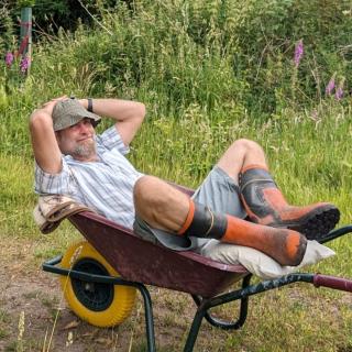 Peter in a wheelbarrow
