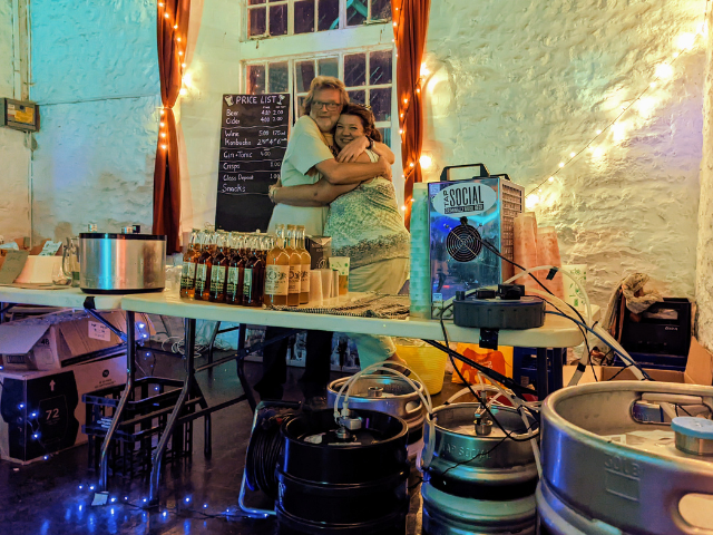 bob and anna working the bar