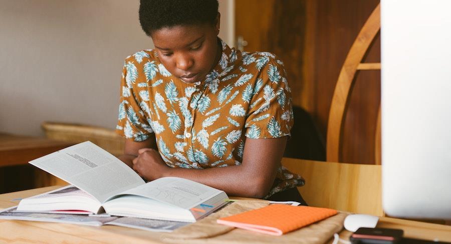 Learner reading book