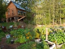 Straw bale - clay house and annuals garden with raised beds